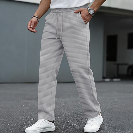 Gray men's waffle-knit drawstring casual pants – styled front view