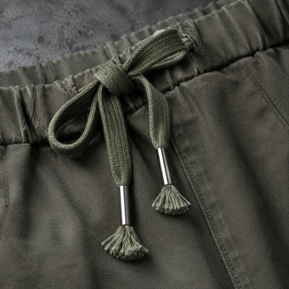 Olive jogger pants elastic drawstring waistband detail