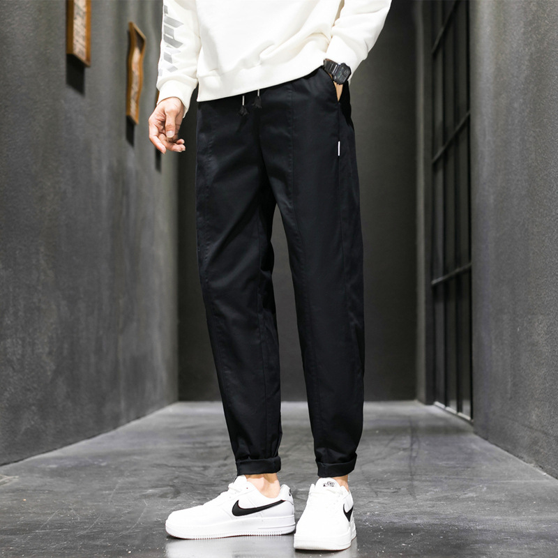 Men's black cotton tapered jogger pants – front view