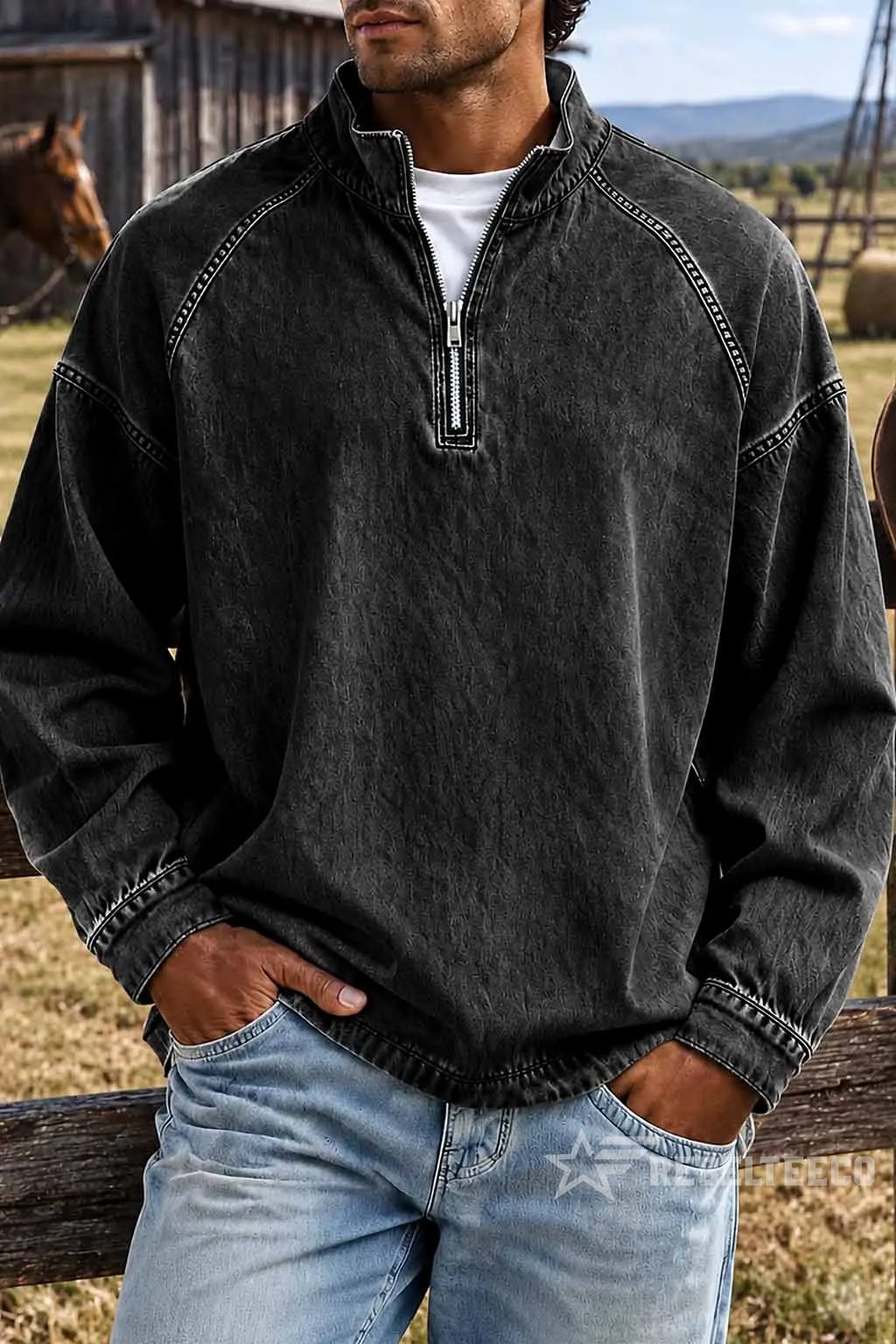 Black men's vintage half-zip cotton pullover in an outdoor setting